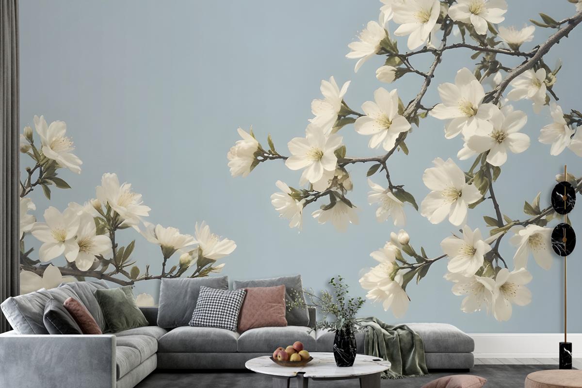 White Flowers Blooming On Tree Branches Against A Pale Blue Sky Wallpaper Mural