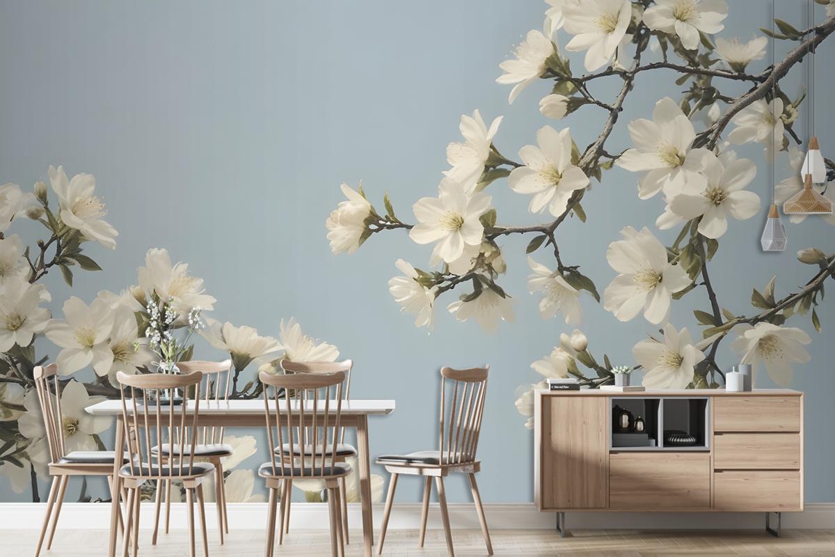 White Flowers Blooming On Tree Branches Against A Pale Blue Sky Wallpaper Mural